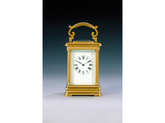 A modern Swiss made brass cased carriage clock,