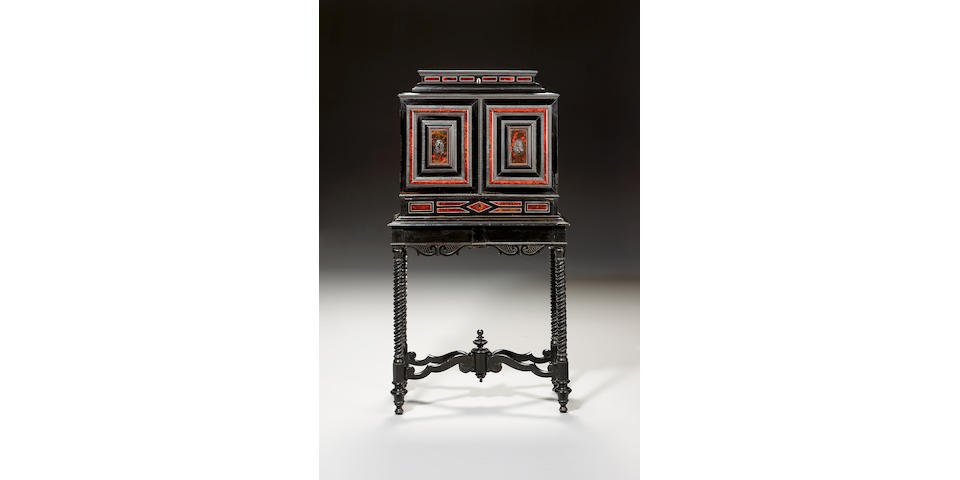 A late 17th Century ebony and tortoiseshell Flemish cabinet on later stand