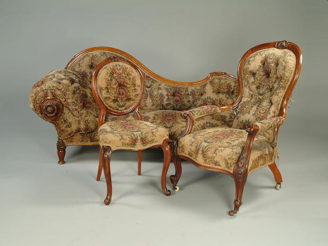 A Victorian walnut matched parlour suite