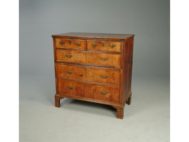 An early 18th century and later walnut and oak chest