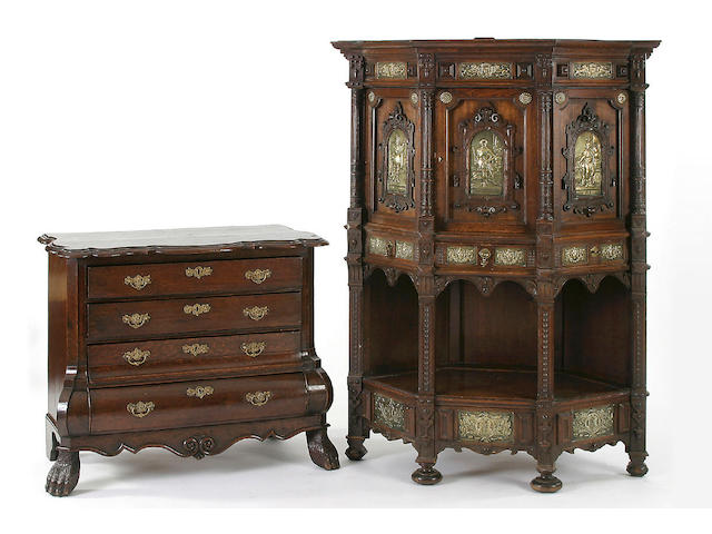 A 19th Century Flemish style carved oak and brass corner cabinet, in the 17th Century style,