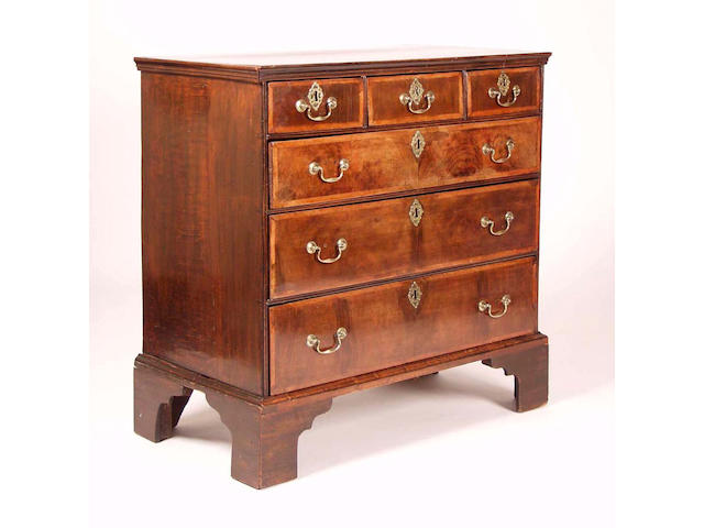 A George II walnut and oak chest