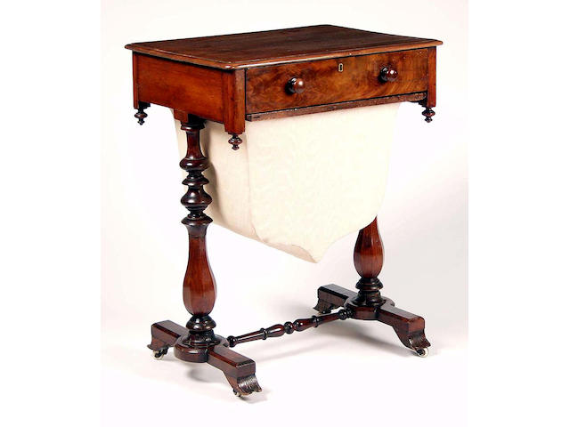 An early Victorian mahogany work table