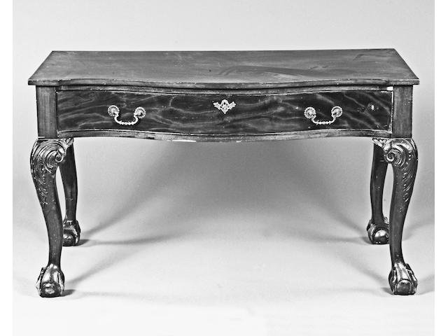 A mahogany Irish style serpentine side table,