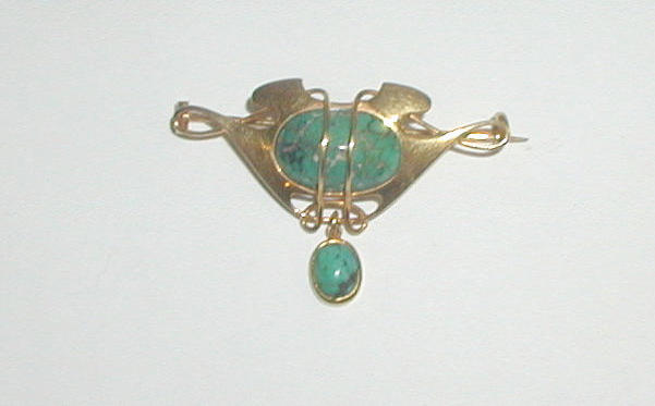 A Murrle Bennett brooch,