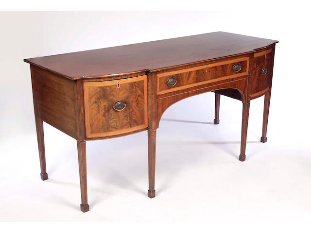 A Regency mahogany and satinwood banded breakfront Sideboard,