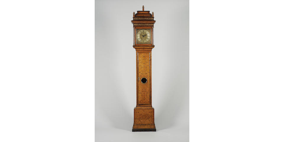 A fine early 18th century seaweed marquetry inlaid walnut longcase clock with maintaining power.  Exhibited at the Franco-British Exhibition of 1908, then the property  of D.A.F. Wetherfield. Christopher Gould, Londini fecit