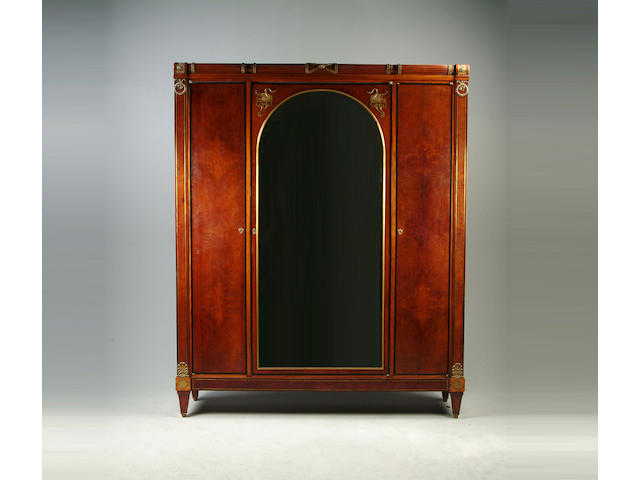 A good Empire revival amboyna, ebonised and brass inlaid wardrobe and bed ensuite