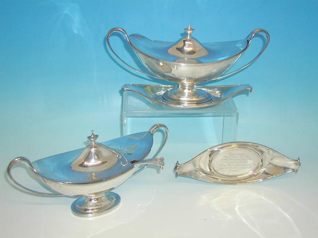 A pair of Scottish twin handled sauce tureens, with matching stands and ladles, by Hamilton and Inches Edinburgh, 1910,