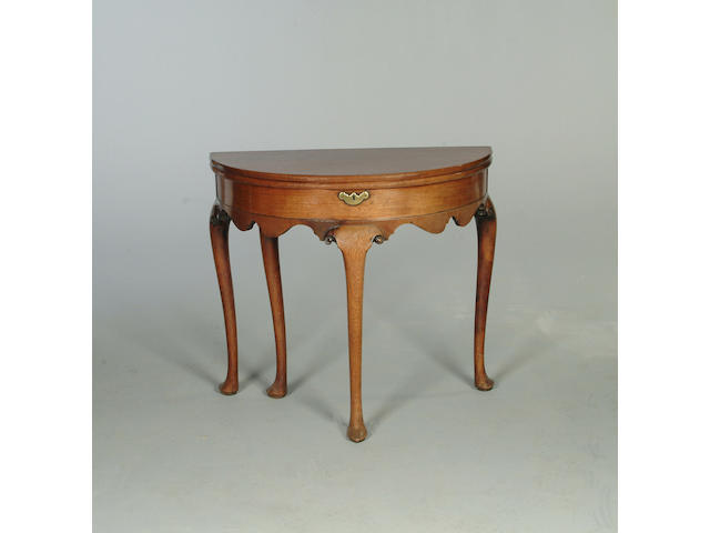 A George II walnut demi line tea table