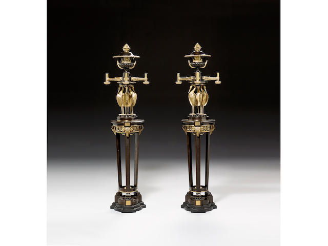A pair of gilt and lacquered bronze eight light Chandeliers,