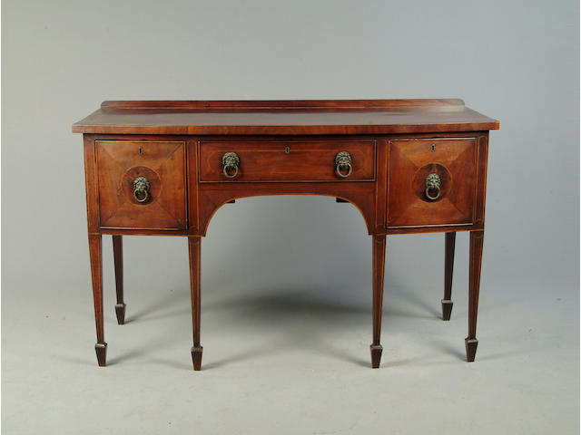 A George III mahogany bowfront sideboard