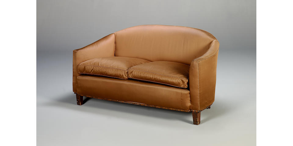 Jacques-Emile Ruhlmann, 1933 A Macassar Ebony and Upholstered Sofa