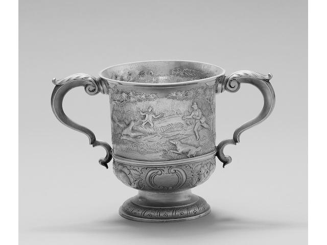 An 18th Channel Islands silver two handled cup, stamped twice with maker's mark LC below a crown, unknown, Jersey circa 1765,