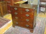 A Regency mahogany chest of drawers, of small proportions,