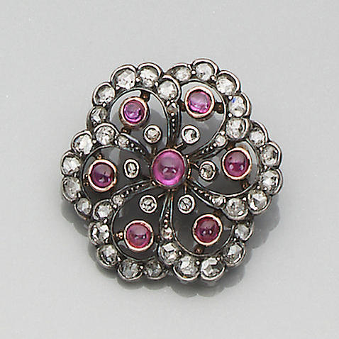 A late 19th century ruby and diamond circlet brooch