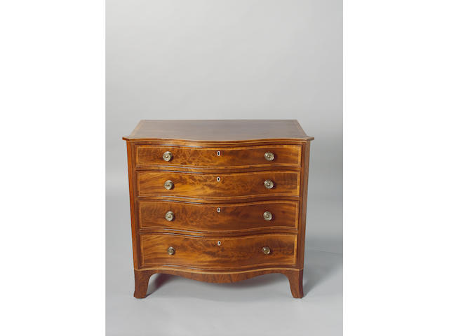 A 19th century Channel Island mahogany serpentine chest,