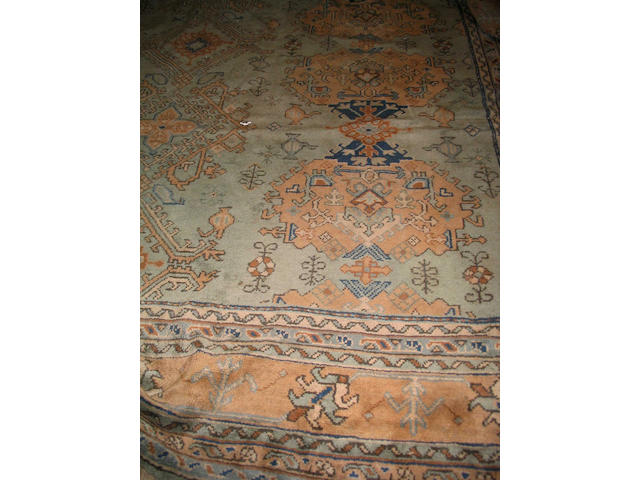A large Ushak carpet West Anatolia, 546cm x 395cm