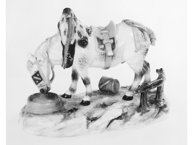 A Meissen porcelain figure of a saddled and harnessed workhorse,