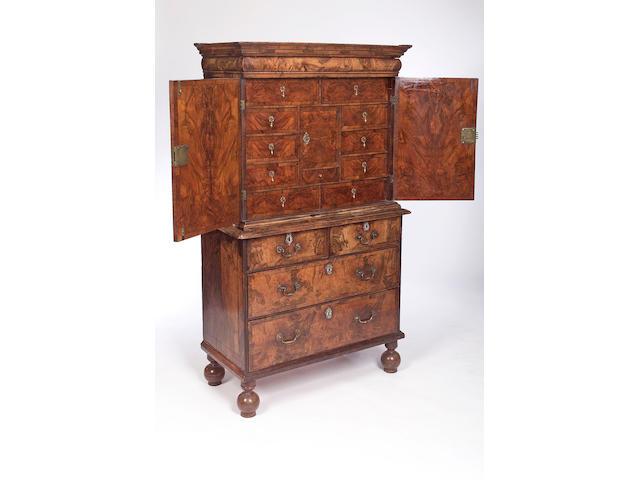 A William and Mary and later walnut Cabinet on Chest,