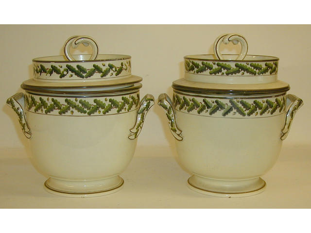 A pair of creamware ice pails, covers and liners,