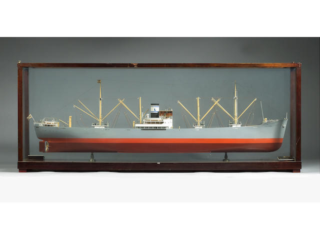 A Cased Builders Model of the Cargo Motorship TIMIOS STAVROS, ex. SKAUVANN 1939 148x56x28cm.(58x22x11in.)