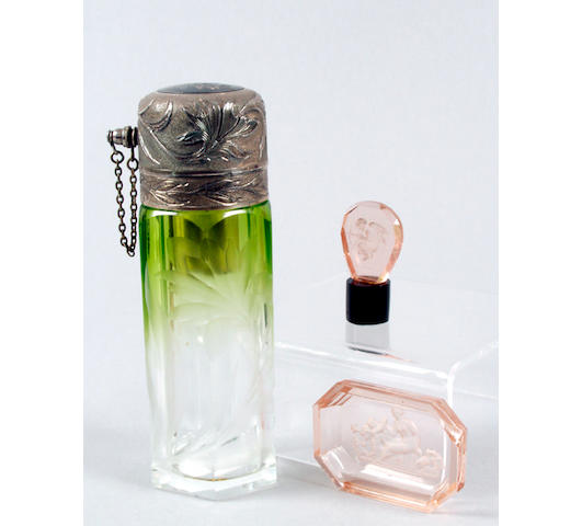 A glass and white metal atomiser unmarked,