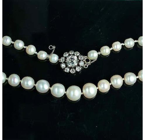 A pearl necklace with diamond clasp