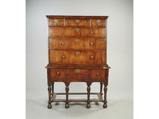A George I walnut and oak chest on stand