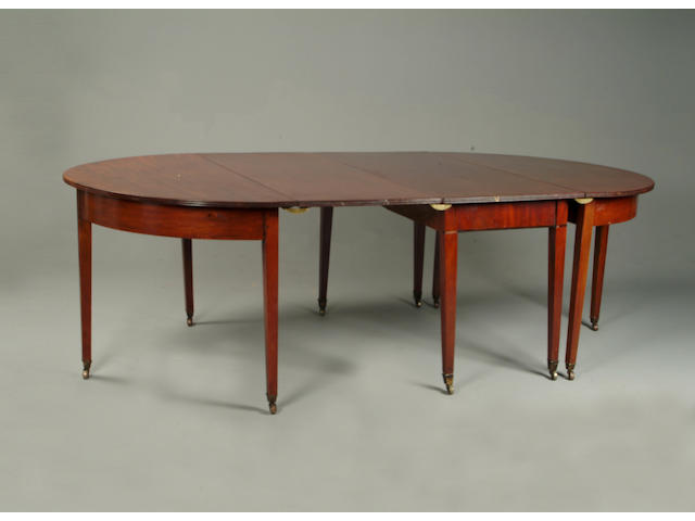An early 19th century mahogany dining table