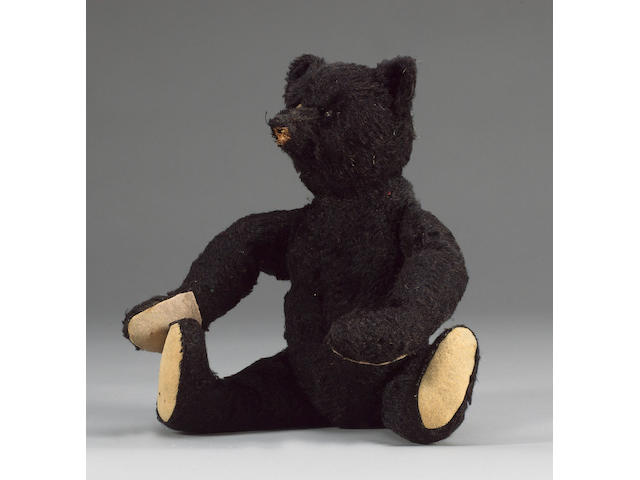 Rare black Steiff Teddy bear, German 1912  This bear was originally given to one of the designers of the Titanic, and has since been passed on through the same family.