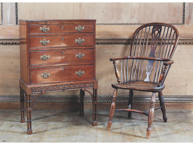 An early 19th Century yew and elm Windsor armchair