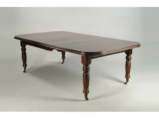 A Victorian mahogany extending dining table