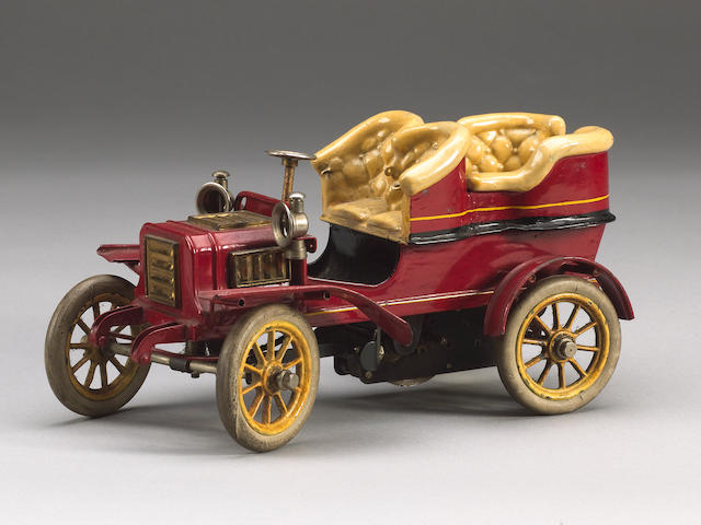 A Bing tinplate four seat rear-entrance Tonneau with automatic steering, German circa 1904