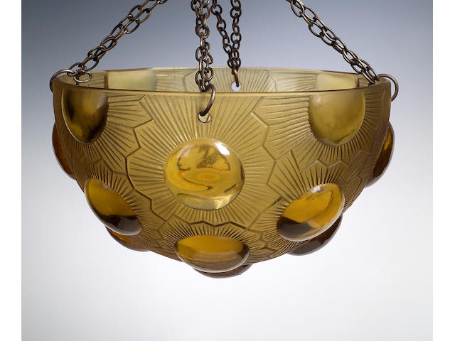 'Soleil', A pair of Rene Lalique amber glass plafoniers,