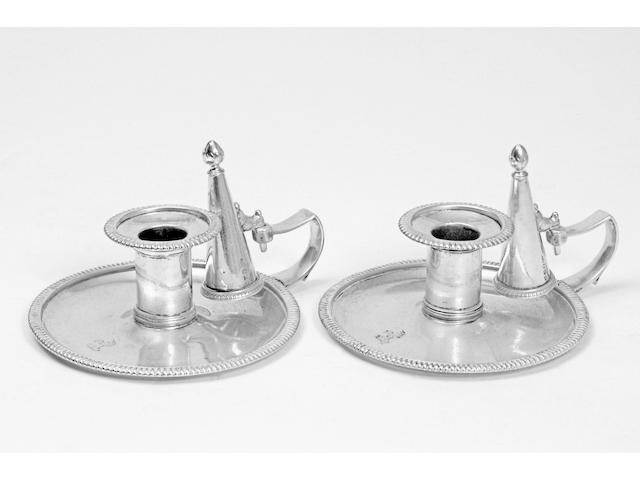 A pair of George III chambersticks, by Richard Cooke, London 1806,