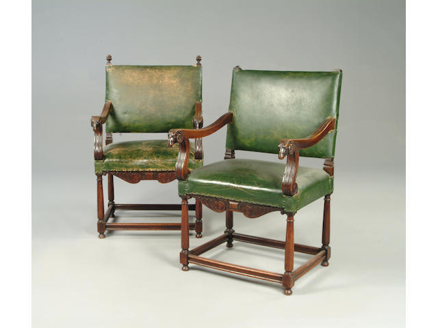 A pair of 17th century style leather upholstered hall chairs
