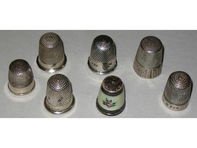 A Continental white metal and floral enamel thimble,