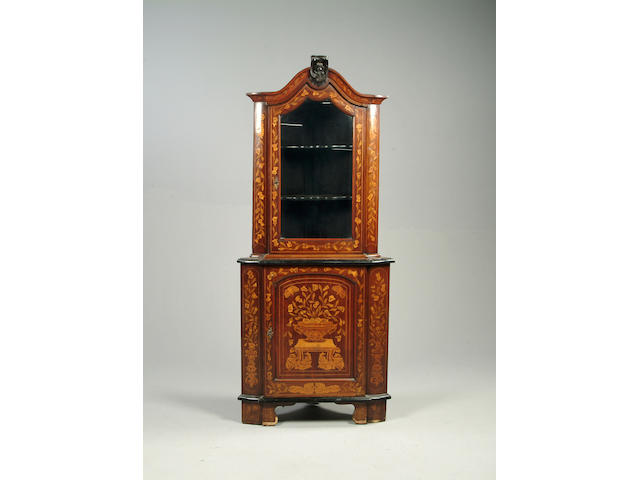 A Dutch marquetry standing corner cabinet