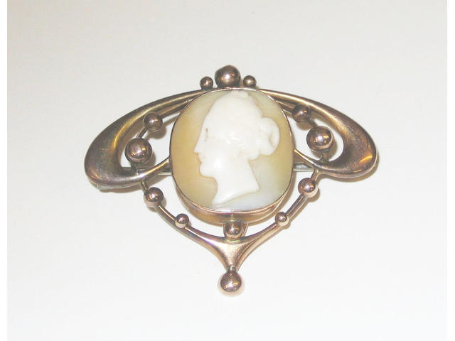 An Art Nouveau shell cameo brooch, unmarked, of mainstream jewellery manufacture,