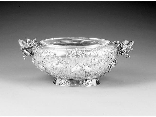 A Chinese silver two-handled oval bowl, impressed character mark in a rectangular punch and three further incuse character marks to the underneath,