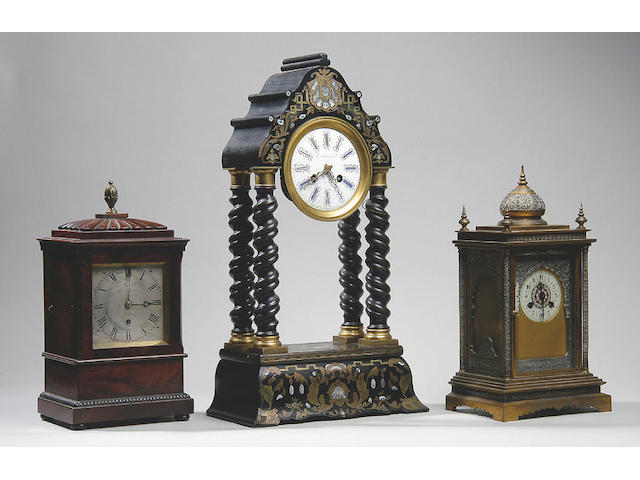 A 19th century brass and silvered mantel clock