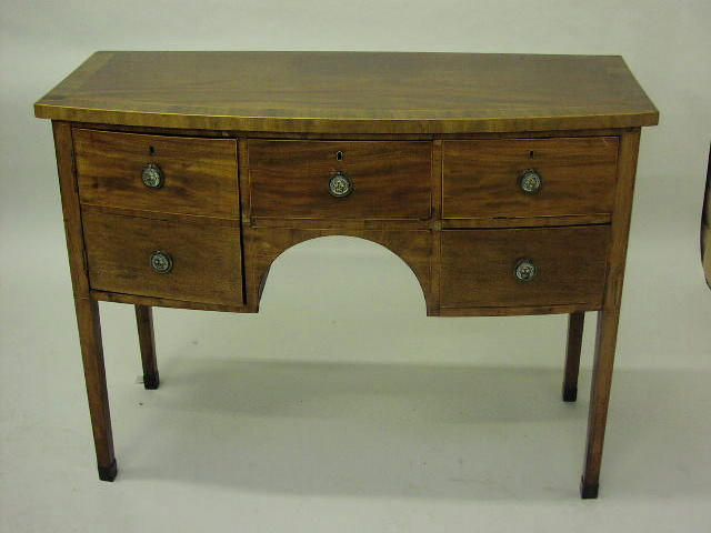 A Regency mahogany and crossbanded bowfront sideboard,