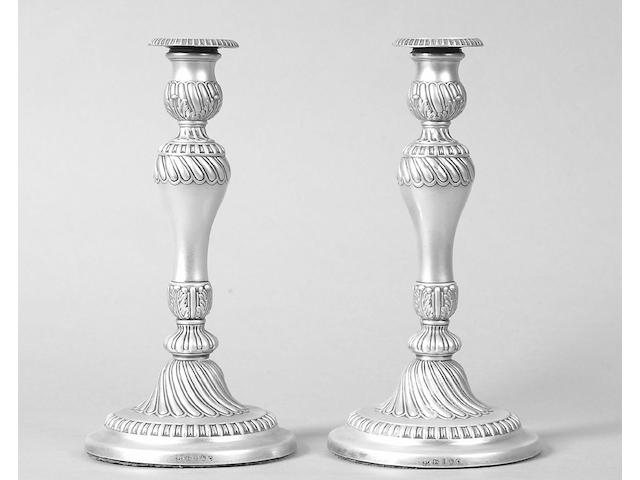 A pair of George III candelsticks  Smith, Tate & Co, Sheffield 1811,