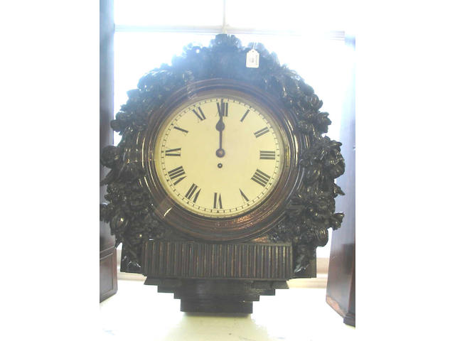 A late 19th Century carved mahogany wall Timepiece,