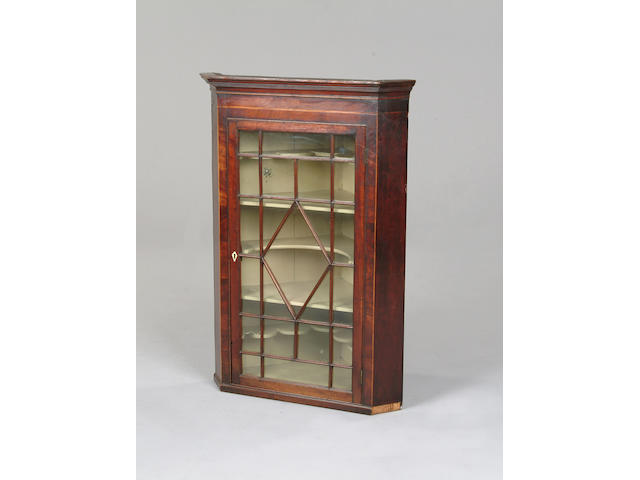A George III mahogany corner display cabinet,