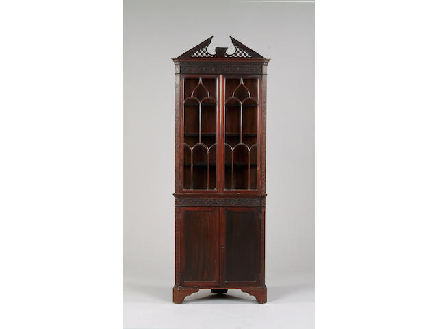 A mahogany Chippendale revival corner display cabinet