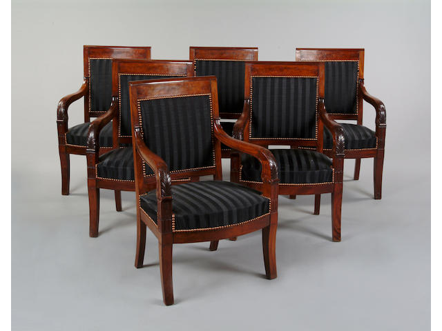 A set of six Empire style mahogany open armchairs