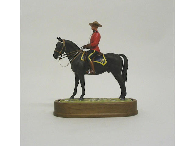 A Royal Worcester limited edition model of a Royal Canadian Mounted Policeman,