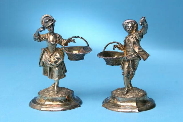 A pair of Victorian figural salts, by Alfred Benson and Henry Hugh Webb, London 1895, inscribed Hunt and Roskill, late Storr and Mortimer, numbered 1401,